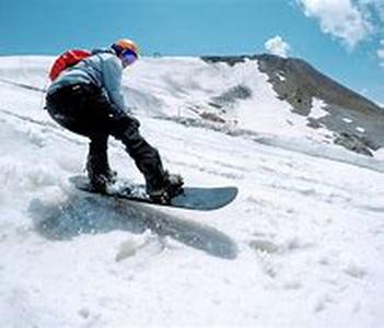 Skiing  Equipment and Events  In skiing or snow skiing, participants glide over snow using skis, which are flat long runners strapped to the feet