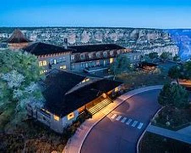 Grand Canyon Helicopter Tours  Viewing the Grand Canyon from the top of a huge boulder is one thing